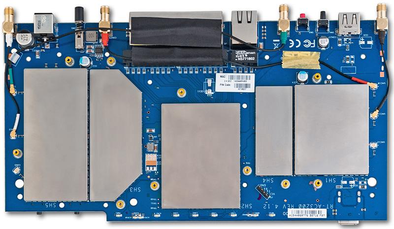 The electronic stuffing of ASUS RT-AC3200 wireless router is one textolite card which has all essential elements located on both of its sides.