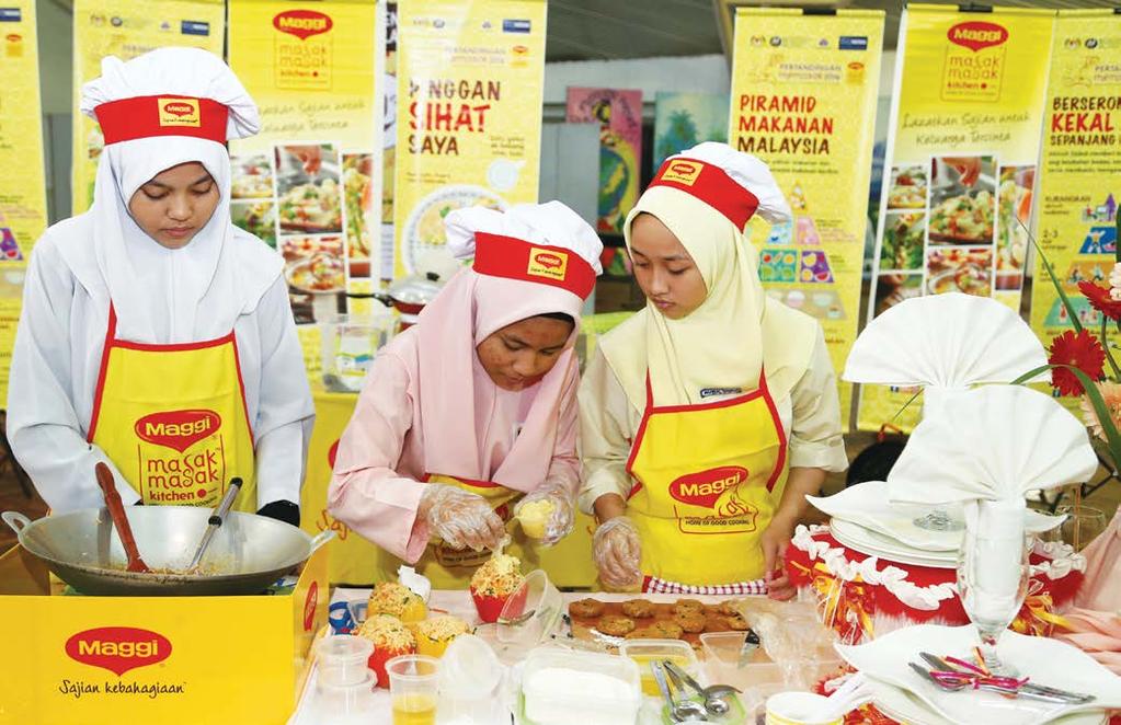 32 NESTLÉ IN SOCIETY REPORT 2016 Nutrition G4-DMA: Local Communities, G4-EC8, G4-SO1 MAGGI Secondary School Cooking Competition Young chefs demonstrating their kitchen skills at the MAGGI Secondary