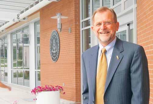 HIGHER EDUCATION John M. Dunn President, Western Michigan University Schools like Western Michigan University are now well established in their economic development roles in our state.