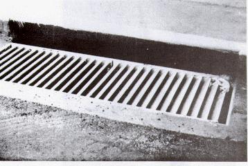 Slotted drain inlet at an intersection. Figure 19. Combination curb-opening, 45 tilt-bar grate inlet. 7.