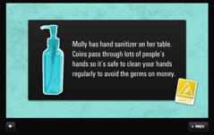 Safety tip Molly has hand sanitizer on her table.