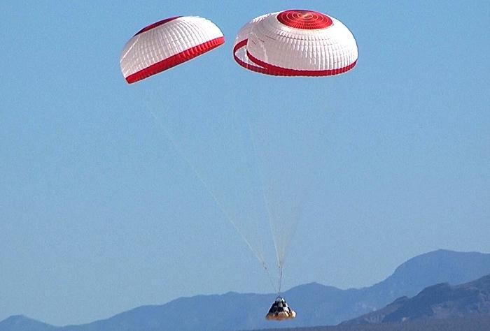 The parachute system was integrated onto a test vehicle, BP with simulated upper parachute interfaces and lifted by an Erickson Aircrane, which provided the initial drop conditions.
