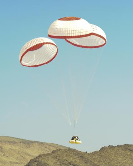 The pilot parachutes were deployed, which released the main retention system and extracted the three main parachutes from their stowed states.
