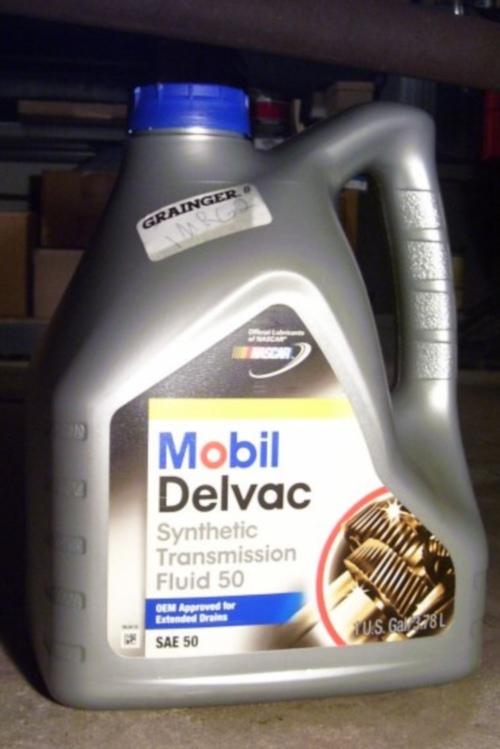 Sample #3 Mobil Delvac Synthetic Transmission Fluid 5 Mobil Delvac STF 5 is produced by Exxon Mobil Corporation and is thought to be the commercial equivalent to the MobilTrans SHC DC.