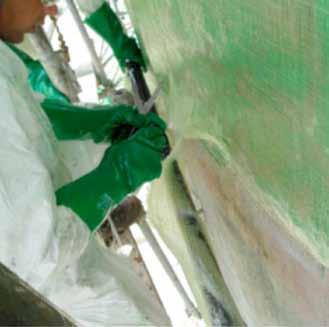 concrete substrate (Figure 13) that allowed the fabric to go all the way down to the limits of the repair area, and