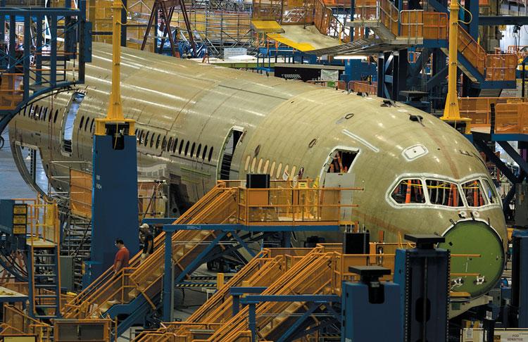orders for 15 airplanes, which cost Boeing at least $4.5 billion. The company also took a $2.5 billion charge in 2009 related to development costs on the Dreamliner program.