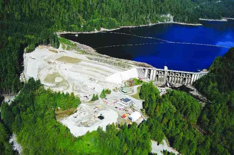Seymour Falls Dam after Remediation New earthfill dam and gravity wall extension, with the original earthfill dam showing as