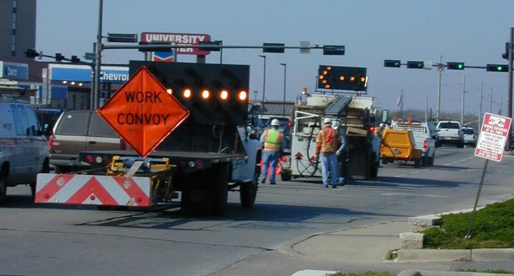 markings, a Type C arrow panel, and a flexible Work Convoy sign. However, as shown in Figure 4, the Work Convoy sign partially blocked the view of the arrow panel.