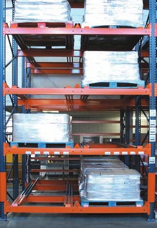 When loading the second pallet, the fork-lift pushes the first one along until it reaches the next set of trolleys -, and deposits the pallet on these.