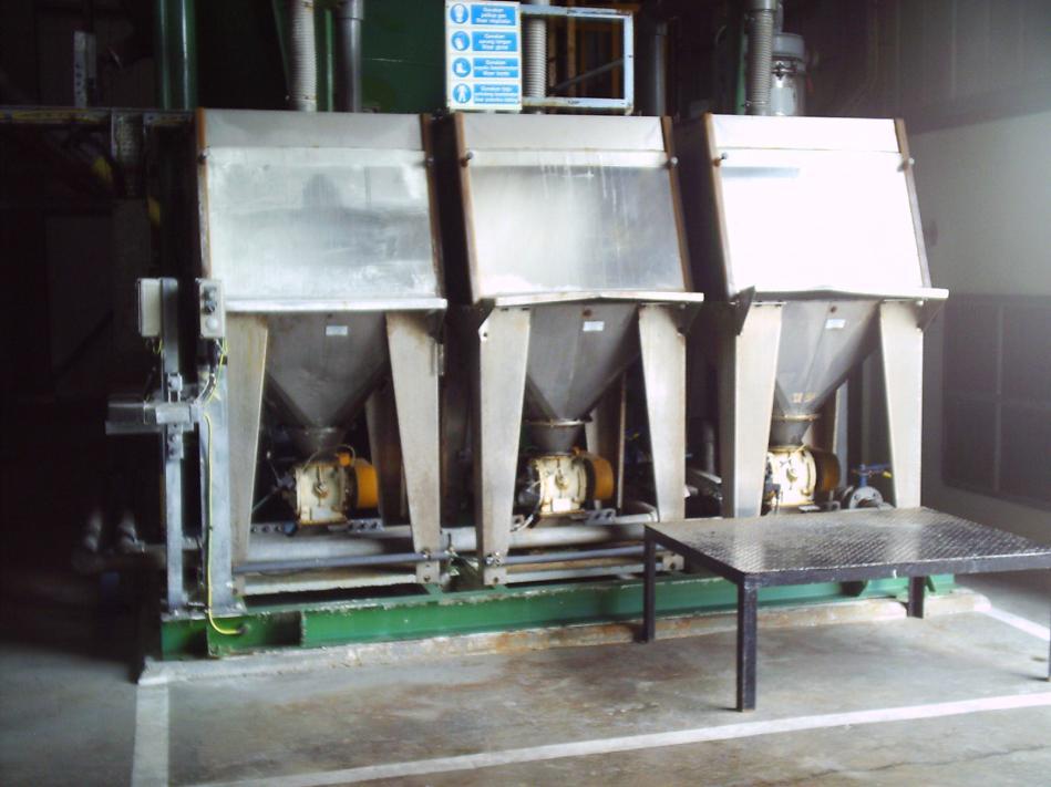 The 25kg hydrated lime bags have to be emptied into a bag unloader manually. Figure 1.4 shows the bag unloaders. From here it is transferred into a silo using compressed air.