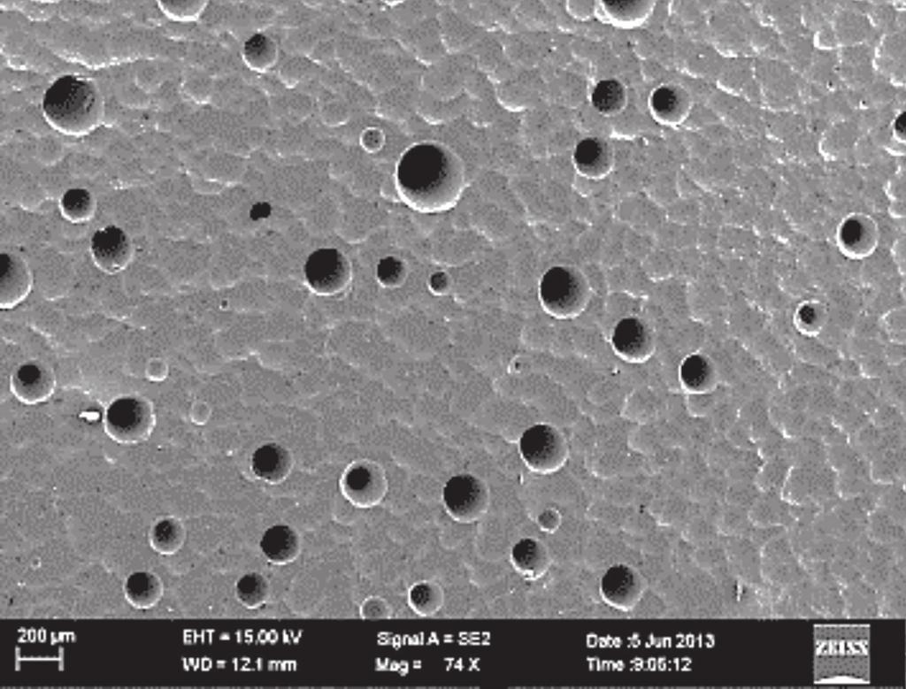 Then on the height of 20 mm (from the bottom) pores begin their growth and the relatively uniform porous zone lasts till the height of 55 mm. The pores have elongated shape, 1.5 2.