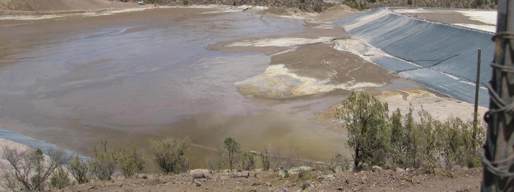 Slurried tailings deposition by spigotting and