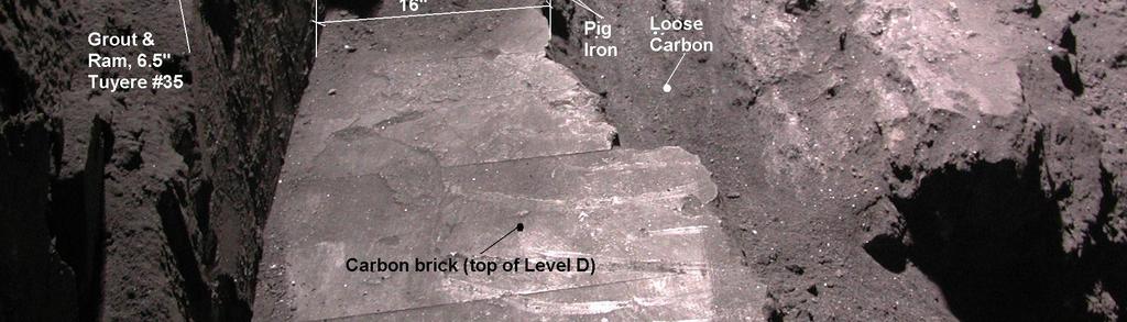 Figure 5: Photograph showing iron penetration under tuyere 35 at 2003 reline The major learning from this experience at II7 was the requirement of a detailed monitoring and assessment