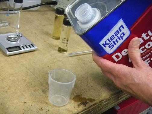 Step 7: Pour some of the alcohol with the dissolved methyl stearate internal standard into the beaker