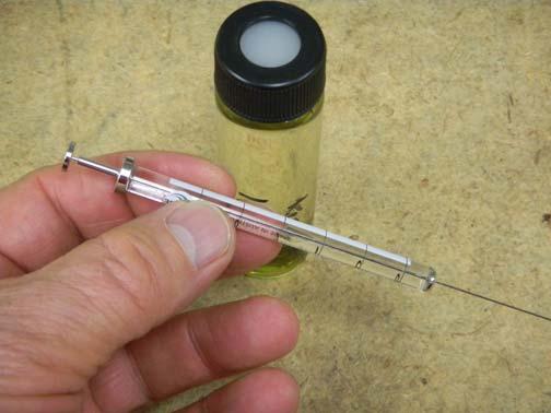 Step 11: Use the provided 10 ul ( 10 microliter ) syringe to suck up 1 ul ( 1 microliter ) of the cannabis