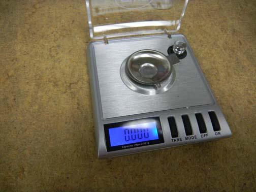 Step 4: Set up the balance ( scale ) which comes with the Model 420 GC.