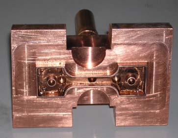 Fig. 1: Copper mould and specimen for thermomechanical tests The thermo-mechanical tests were carried out by using a universal testing machine (Instron 8500), equipped with a furnace (MTS 653).