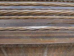 #3 reinforcing bars located near the mid-span of the girder, parallel to the top