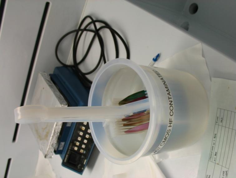diffused regions). This step should be carried out by the lab TA for safety. Load the wafers into a Teflon cassette and submerge in 6:1 BOE until the SiO 2 and BSG is completely removed.