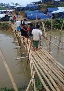 Bamboo bridge Improved ventilation Stoves & shelving Mud walls protected