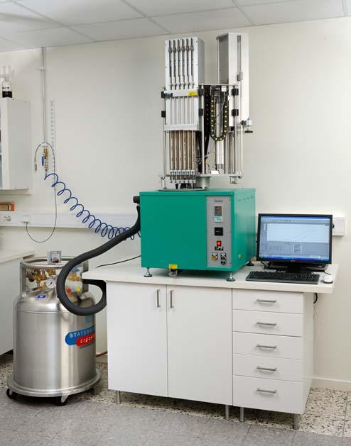 The computer controls both the temperature rise and measures the length change of the samples.
