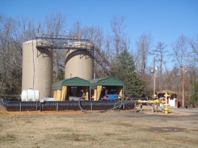 Location: The Jessica 1-4 Saltwater Disposal Well Photo # 6 of 7 Date: 12-13-12 Time: 1143 Description: Above ground storage and pumps