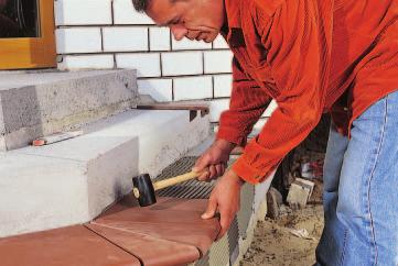 In the process, ensure uniform joints between the stair tread tiles and