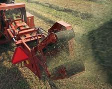 Bales up to 36-inches long easily clear the tension rails before they are grasped by the thrower belts.