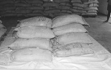 Layer 2: Two rows of three gunny bags each. Figure 3.