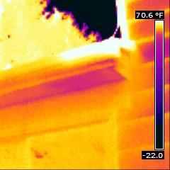 High moisture content is visible at soffit above rear dining