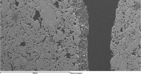 Sinter matrix Interphase Dunite mini lump Figure 5. Micrography of sinter. Dunite minilump and sinter interphase.
