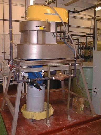 Arsenic Wastewater Treatment Systems- Centrifuge Industrial sized centrifuge used to remove suspended GaAs particles before hitting the wastewater