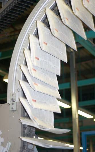 Requirements Mechanical grippers set new standards for automated handing of paper rolls Demag for all crane logistics needs in King s Lynn Palm Paper ordered the crane technology including all crane
