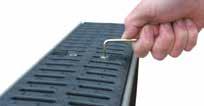 used in conjunction with a number of gratings*. The system is fitted to the gratings by two M6 security screws, and clamps the grating in place preventing removal.