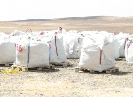 Overburden was collected in piles, oil shale in 1m 3 bags by 0.5 m intervals.