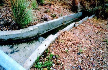 Drainage chute SIDE DRAINS Side drains are important links in the road drainage system. The most common problems associated with side drains are standing water, lack of capacity and erosion.