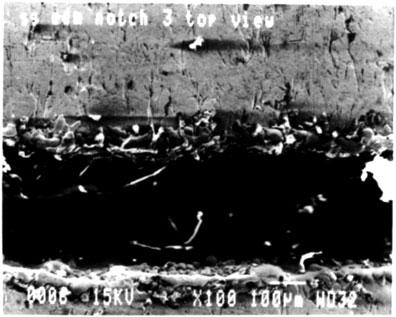 Figure 6. SEM micrograph of EDM notch. Top view 100X. CONCLUSIONS The results presented in this paper show that in certain instances EDM notches and fatigue cracks give similar eddy current responses.
