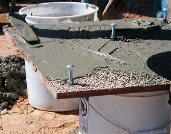 cement, sand and potable water to the back of the tile.