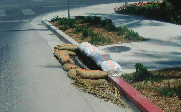 Excellent storm drain inlet protection with gravel-fi lled bags surrounding the