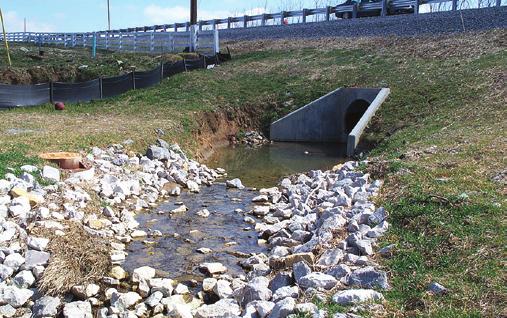 If fl ow from culvert enters a channel, make sure the channel is lined with rock, vegetation, and