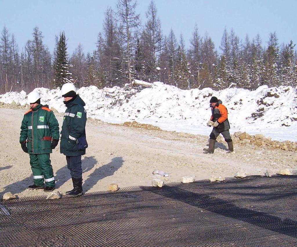 Tensar geogrid being installed on a project in Eastern Siberia at a temperature of -40 C.