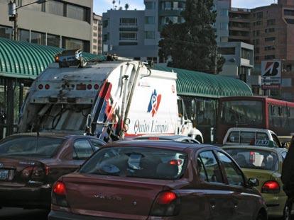 In Quito, sometimes the expropriation of busway space even extends to public utility vehicles, such as garbage trucks (Figure 7.4).