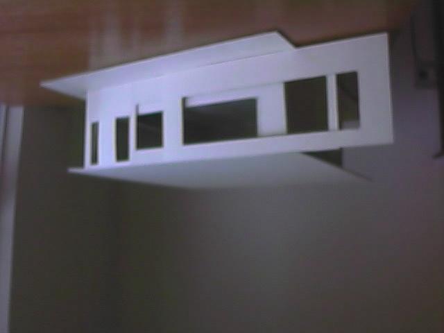 The scale model has removable walls with different combinations and a removable overhang, as shown in figure. Fig. : the scale model with overhang.