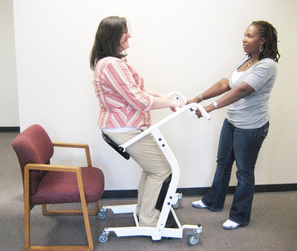 STEP 6 Have the patient lower themselves down onto the seat while keeping their knees/shins in the knee/shin pads and