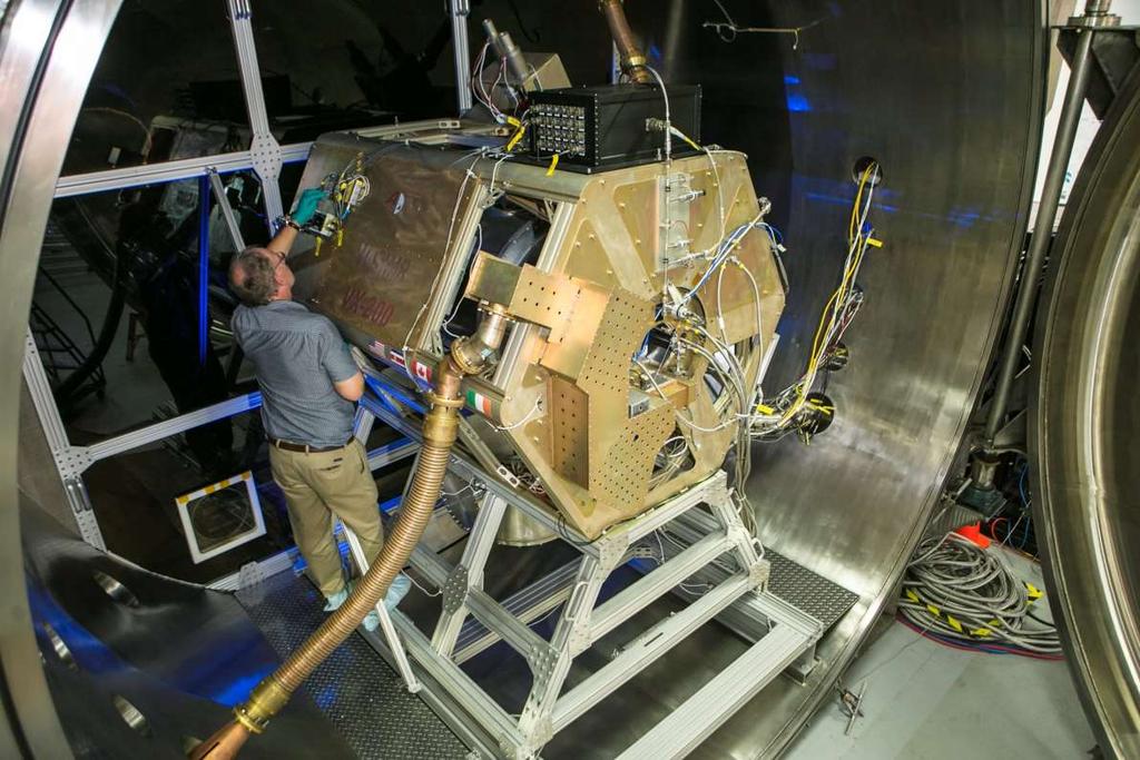 The VX-200 VASIMR experiment in Ad Astra s 150 m 3 differentially pumped vacuum chamber, circa 2011 Plastic panels were used to isolate vacuum on the plasma side from vacuum on the RF circuit side.