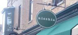 An awning that has signage on its sides can replace the need for a projecting sign because