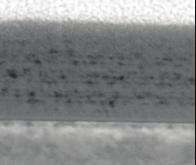 To evaluate if this mechanism is a possible explanation of the too high absorption of the AP-PECVD a-sin x :H initially made, TEM pictures of thin films slide have been made.
