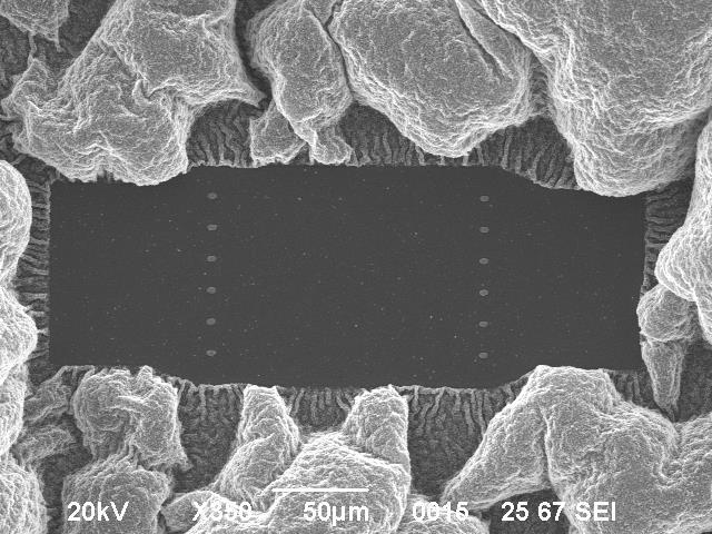 (b) Optical micrographs of fabricated underpass metal contact area, poly resistor with contact pad and ground line.