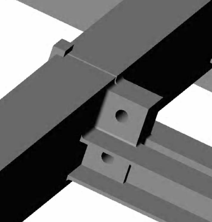 The rail assemblies are held together at their junctions by four seven-eighth inch diameter bolts which pass through 1 1/4 X 3 X 6 inch plates welded to the rail ends.