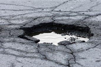 14 Pothole Repair - Avoiding Costly Liabilities Potholes represent an annoyance to